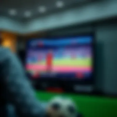 Close-up of a television showing a live soccer game